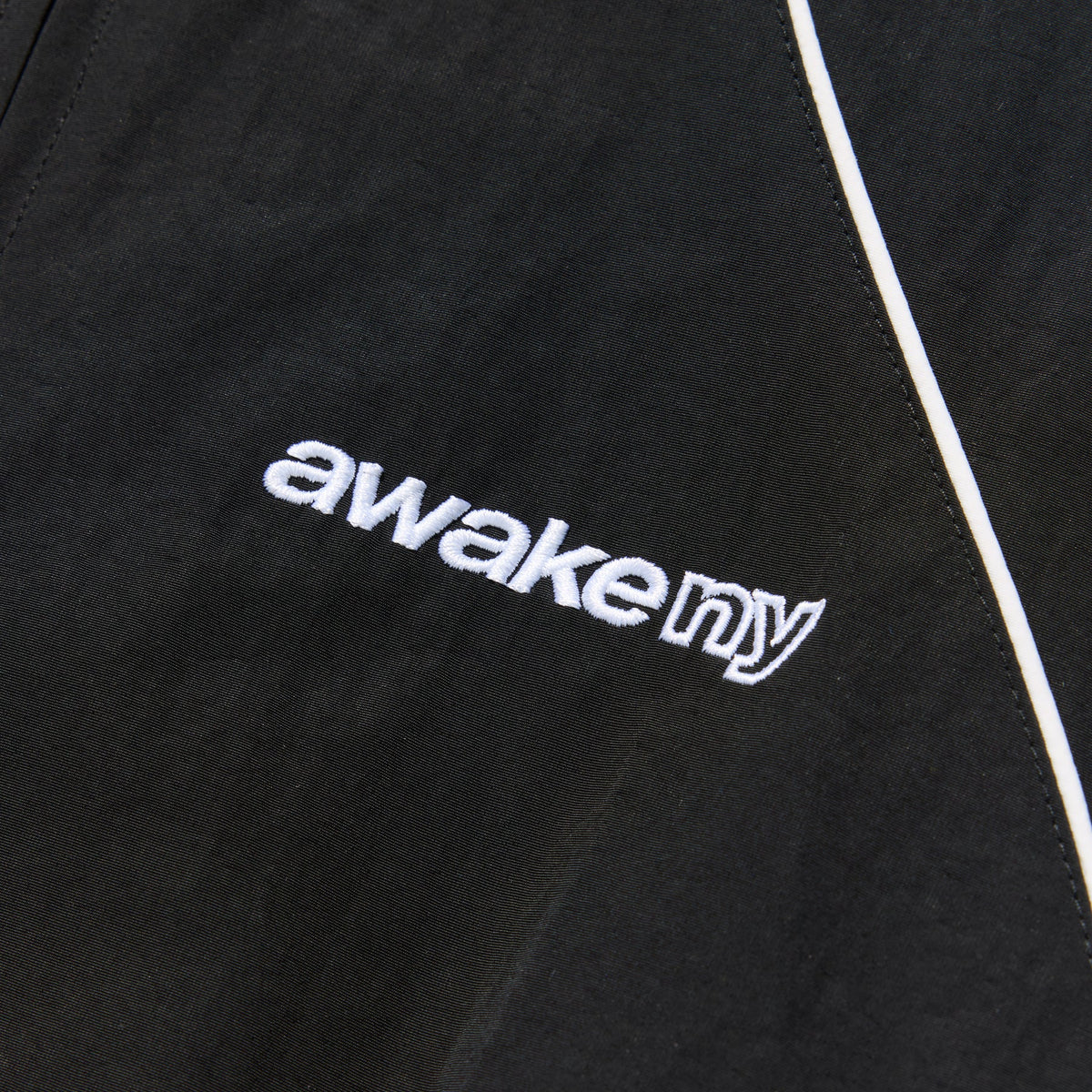 LES PERFORMANCE TRACK JACKET BLACK